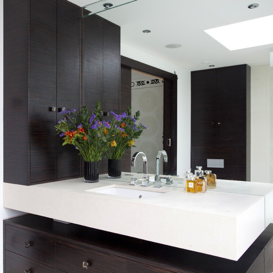 Interior Design Luxury Bespoke bathroom, gold wall, mirror bath, black and white tiles